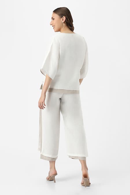 Shop Kaveri Off White 100% Linen Solid V Neck Zen Layered Top With Pant at Aza Fashions Shop_Kaveri_Off White 100% Linen Solid V Neck Zen Layered Top With Pant _at_Aza_Fashions