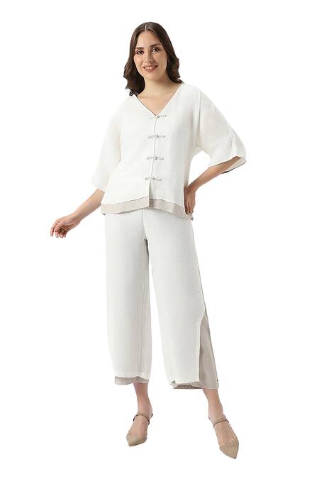 Shop Kaveri Off White 100% Linen Solid V Neck Zen Layered Top With Pant Online at Aza Fashions Shop_Kaveri_Off White 100% Linen Solid V Neck Zen Layered Top With Pant _Online_at_Aza_Fashions