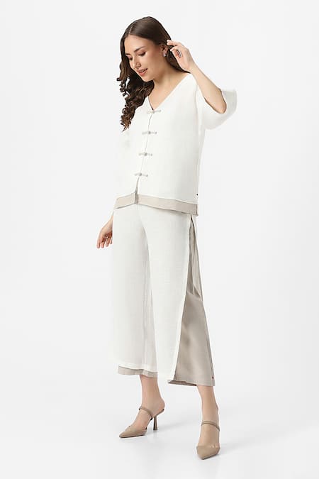 Kaveri Off White 100% Linen Solid V Neck Zen Layered Top With Pant at Aza Fashions Kaveri_Off White 100% Linen Solid V Neck Zen Layered Top With Pant _at_Aza_Fashions
