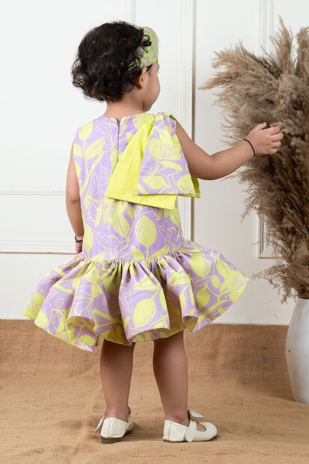 Shop Lil Angels Purple Muslin, Cotton Ruffles, Bows Floral Pattern Short Dress at Aza Fashions Shop_Lil Angels_Purple Muslin, Cotton Ruffles, Bows Floral Pattern Short Dress _at_Aza_Fashions