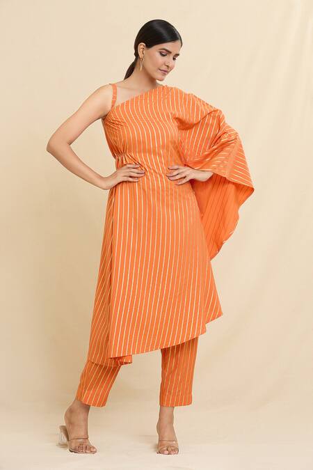 Naintara Bajaj Orange Crepe Asymmetric Stripe Pattern Kurta And Trouser Set at Aza Fashions Naintara Bajaj_Orange Crepe Asymmetric Stripe Pattern Kurta And Trouser Set_at_Aza_Fashions