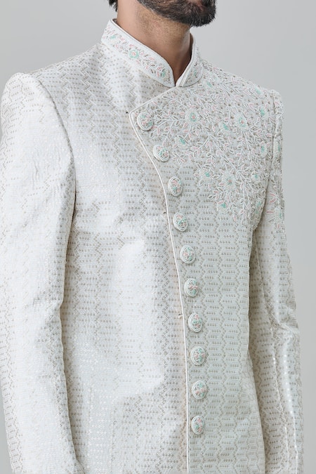 Arihant Rai Sinha Off White Silk Sequins Flower Artwork Embroidered Sherwani With Churidar at Aza Fashions Arihant Rai Sinha_Off White Silk Sequins Flower Artwork Embroidered Sherwani With Churidar _at_Aza_Fashions