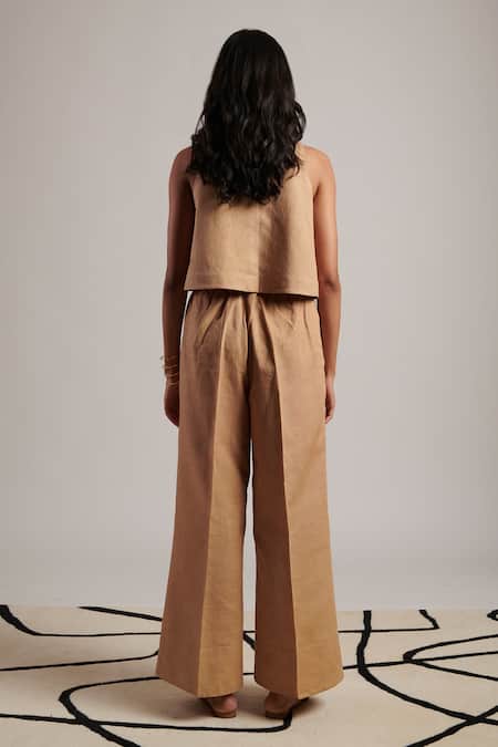 Shop Moh India Beige 100% Pure Linen Plain Celeste Flared Trouser at Aza Fashions Shop_Moh India_Beige 100% Pure Linen Plain Celeste Flared Trouser _at_Aza_Fashions