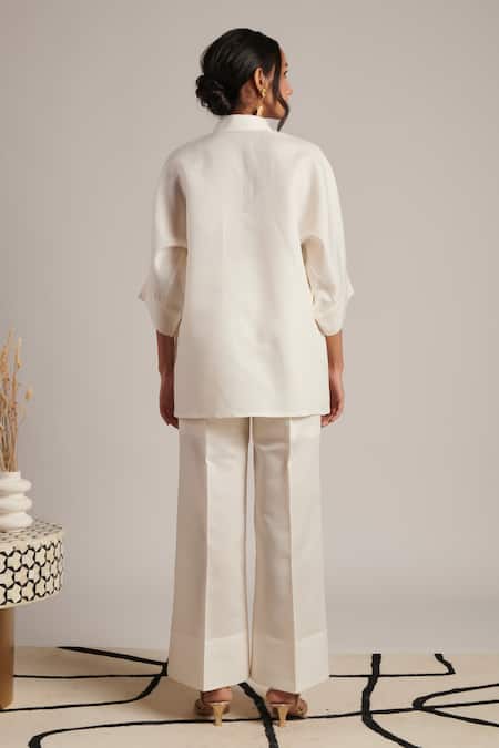 Shop Moh India Off White 100% Pure Linen Plain Celeste Solid Flared Trouser at Aza Fashions Shop_Moh India_Off White 100% Pure Linen Plain Celeste Solid Flared Trouser _at_Aza_Fashions