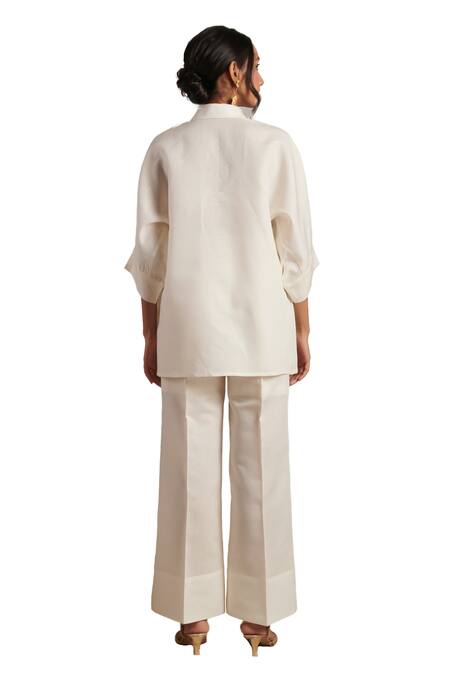 Moh India Off White 100% Pure Linen Plain Celeste Solid Flared Trouser Online at Aza Fashions Moh India_Off White 100% Pure Linen Plain Celeste Solid Flared Trouser _Online_at_Aza_Fashions