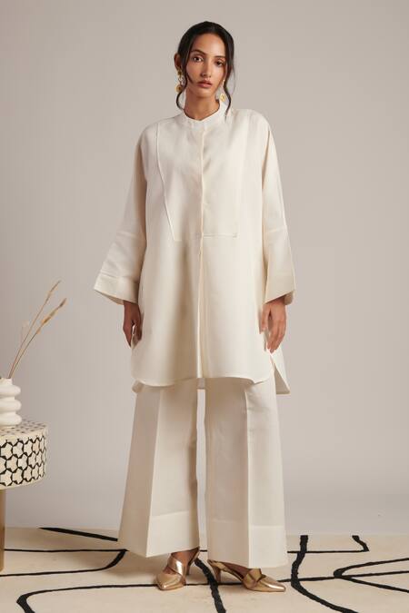 Shop Moh India Off White 100% Pure Linen Plain Celeste Solid Flared Trouser Online at Aza Fashions Shop_Moh India_Off White 100% Pure Linen Plain Celeste Solid Flared Trouser _Online_at_Aza_Fashions