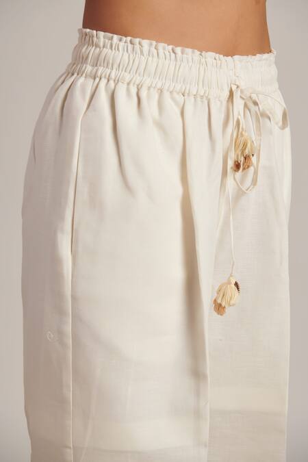 Buy Moh India Off White 100% Pure Linen Plain Celeste Solid Flared Trouser Buy_Moh India_Off White 100% Pure Linen Plain Celeste Solid Flared Trouser