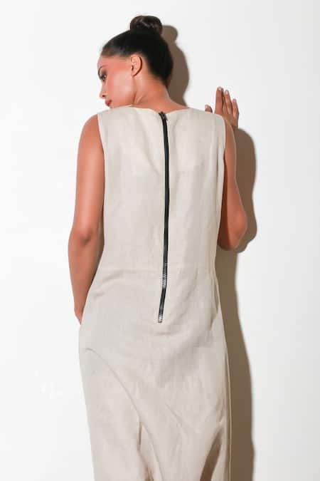 Echke White Linen Asymmetric Solid Jumpsuit at Aza Fashions Echke_White Linen Asymmetric Solid Jumpsuit _at_Aza_Fashions