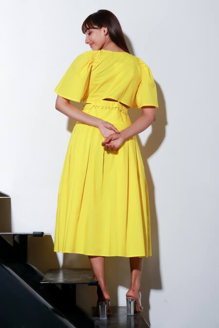 Shop Echke Yellow Cotton Round Neck Solid Midi Dress at Aza Fashions Shop_Echke_Yellow Cotton Round Neck Solid Midi Dress _at_Aza_Fashions