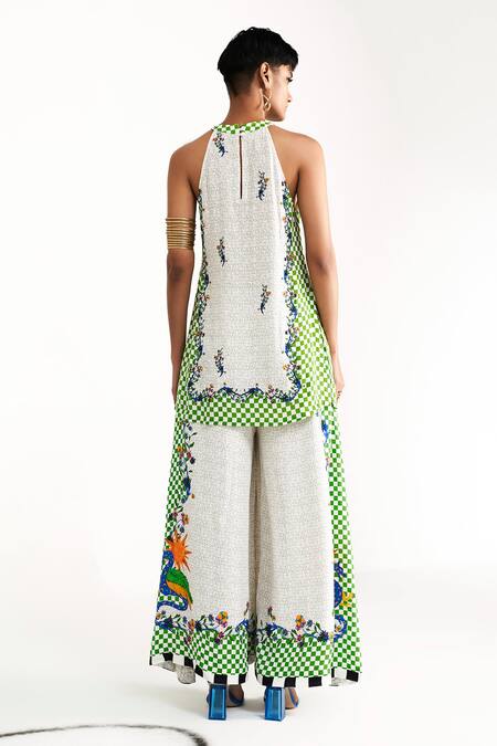 Shop Verb By Pallavi Singhee White Georgette Sequins Halter Neck Printed Kurta And Wide Legged Pant Set at Aza Fashions Shop_Verb By Pallavi Singhee_White Georgette Sequins Halter Neck Printed Kurta And Wide Legged Pant Set_at_Aza_Fashions