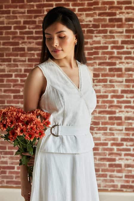 Shruti Sancheti White Cotton Lace, Buckles V-neck Embellished Top Skirt Set at Aza Fashions Shruti Sancheti_White Cotton Lace, Buckles V-neck Embellished Top Skirt Set _at_Aza_Fashions