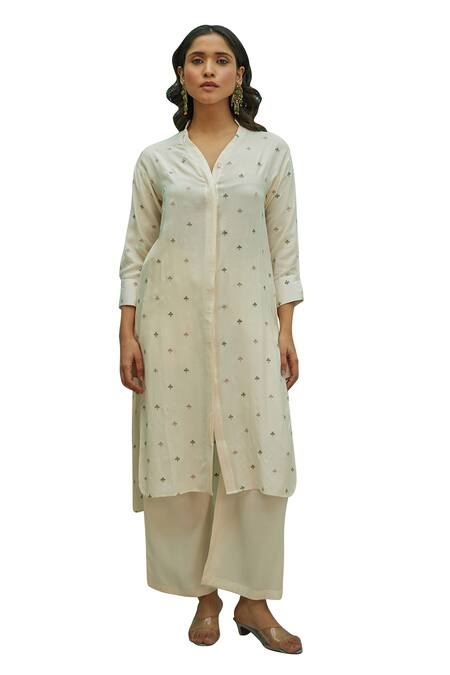 Shop Kapraaaha Ivory Muslin Embroidery V-neck High Low Tunic And Pant Set Online at Aza Fashions Shop_Kapraaaha_Ivory Muslin Embroidery V-neck High Low Tunic And Pant Set_Online_at_Aza_Fashions