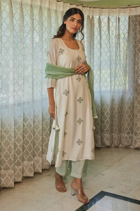 Kapraaaha Ivory Muslin Embroidery Round Neck Straight Kurta And Pant Set Online at Aza Fashions Kapraaaha_Ivory Muslin Embroidery Round Neck Straight Kurta And Pant Set_Online_at_Aza_Fashions