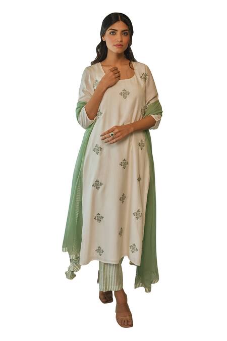 Buy Kapraaaha Ivory Muslin Embroidery Round Neck Straight Kurta And Pant Set Online at Aza Fashions Buy_Kapraaaha_Ivory Muslin Embroidery Round Neck Straight Kurta And Pant Set_Online_at_Aza_Fashions