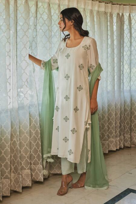 Shop Kapraaaha Ivory Muslin Embroidery Round Neck Straight Kurta And Pant Set Online at Aza Fashions Shop_Kapraaaha_Ivory Muslin Embroidery Round Neck Straight Kurta And Pant Set_Online_at_Aza_Fashions