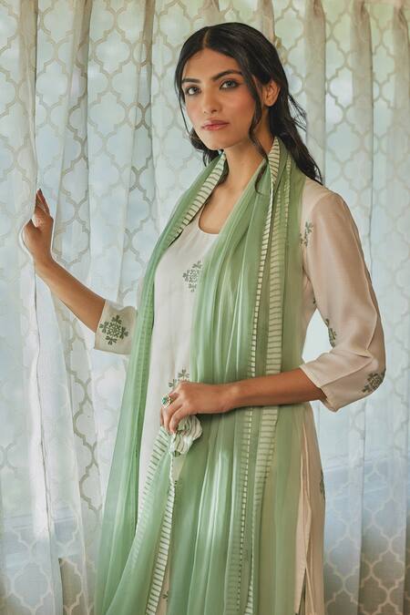 Buy Kapraaaha Ivory Muslin Embroidery Round Neck Straight Kurta And Pant Set Buy_Kapraaaha_Ivory Muslin Embroidery Round Neck Straight Kurta And Pant Set