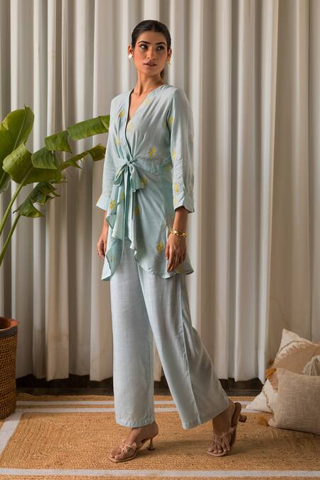 Kapraaaha Blue Top Muslin Embroidered Thread V Neck Floral Tie-up And Pant Set Online at Aza Fashions Kapraaaha_Blue Top Muslin Embroidered Thread V Neck Floral Tie-up And Pant Set_Online_at_Aza_Fashions