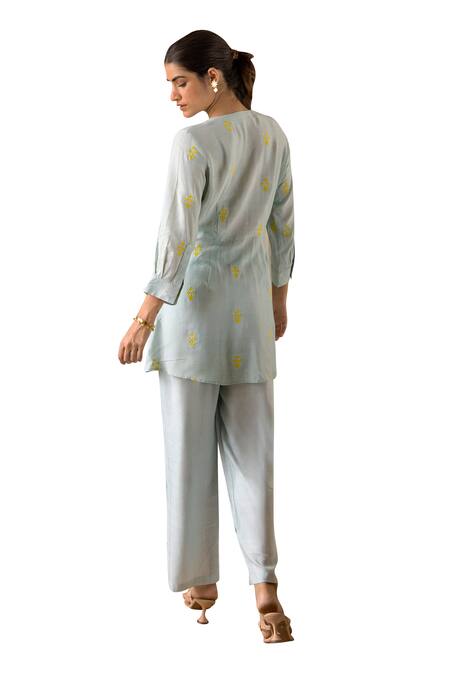 Buy Kapraaaha Blue Top Muslin Embroidered Thread V Neck Floral Tie-up And Pant Set Buy_Kapraaaha_Blue Top Muslin Embroidered Thread V Neck Floral Tie-up And Pant Set