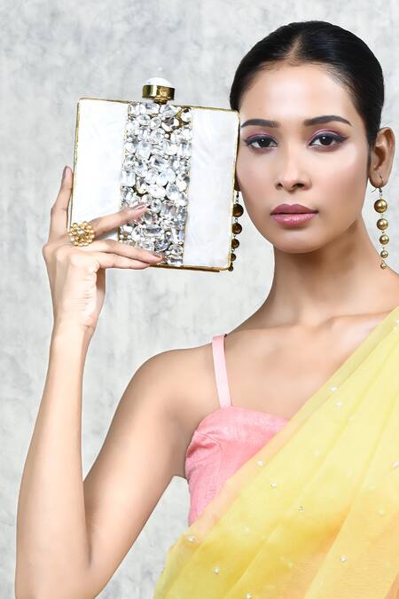 The Tan Clan Gold Mother Of Pearl Liyana Embellished Square Clutch at Aza Fashions The Tan Clan_Gold Mother Of Pearl Liyana Embellished Square Clutch _at_Aza_Fashions