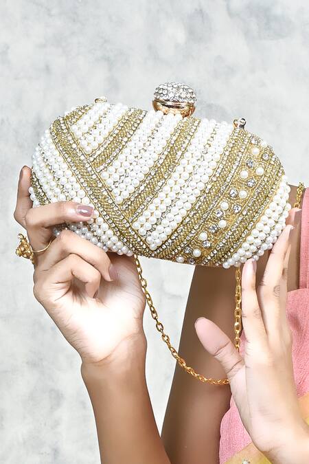The Tan Clan Gold Nalki Rabia Hand Embroidered Clutch at Aza Fashions The Tan Clan_Gold Nalki Rabia Hand Embroidered Clutch _at_Aza_Fashions