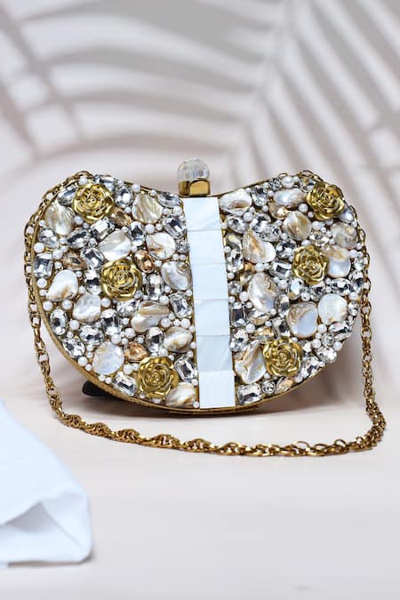 Shop_The Tan Clan_Gold Mother Of Pearl Seher Heart Shaped Embellished Clutch _at_Aza_Fashions