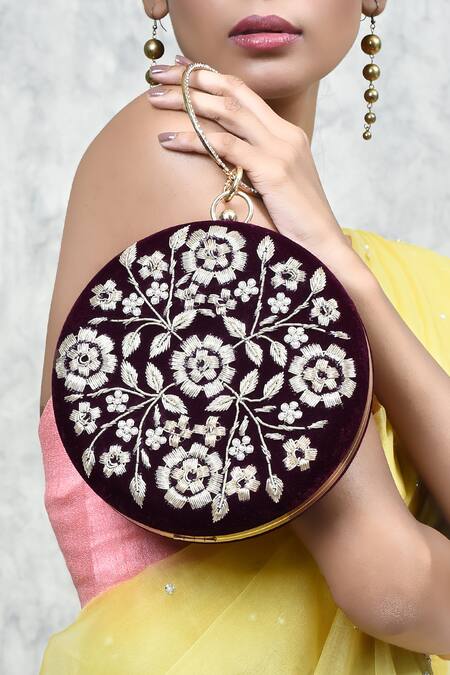 The Tan Clan Maroon Zari, Pearls Shalimar Velvet Zardosi Embroidered Clutch at Aza Fashions The Tan Clan_Maroon Zari, Pearls Shalimar Velvet Zardosi Embroidered Clutch _at_Aza_Fashions