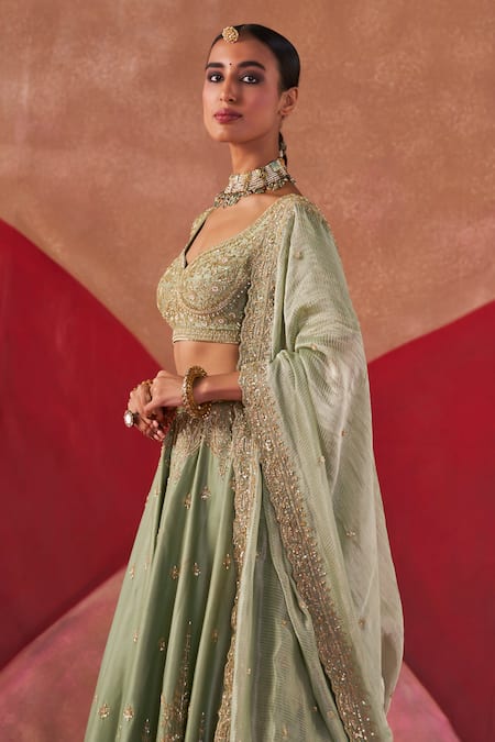 Buy Jigar Mali Green Brocade, Organza Embroidery, Sequins Asymmetric Dori Blouse Lehenga Set Buy_Jigar Mali_Green Brocade, Organza Embroidery, Sequins Asymmetric Dori Blouse Lehenga Set