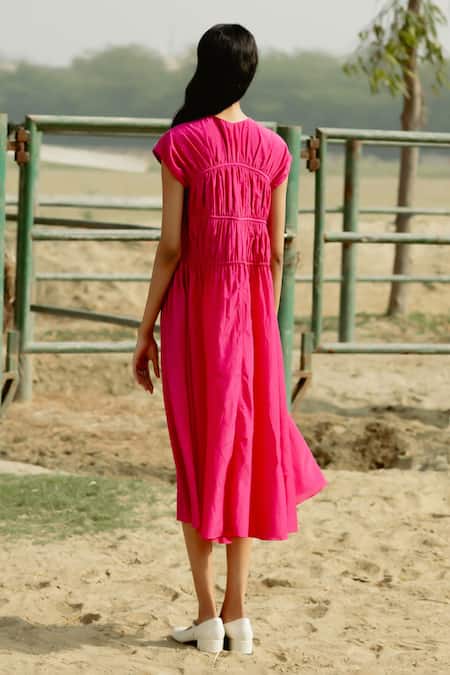 Shop Raasa Pink Cotton Muslin Solid V Neck Front Tie Up Midi Dress at Aza Fashions Shop_Raasa_Pink Cotton Muslin Solid V Neck Front Tie Up Midi Dress _at_Aza_Fashions