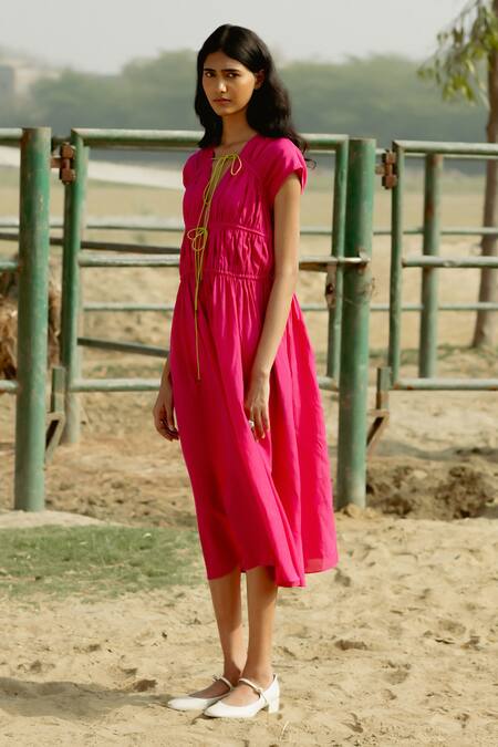 Buy Raasa Pink Cotton Muslin Solid V Neck Front Tie Up Midi Dress Online at Aza Fashions Buy_Raasa_Pink Cotton Muslin Solid V Neck Front Tie Up Midi Dress _Online_at_Aza_Fashions