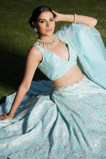 Monk & Mei By Sonia Anand_Blue Brocade Pearls, Mirrors Plunge Neck Floral Woven Lehenga Set _Online_at_Aza_Fashions