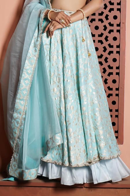 Monk & Mei By Sonia Anand_Blue Brocade Pearls, Mirrors Plunge Neck Floral Woven Lehenga Set _at_Aza_Fashions