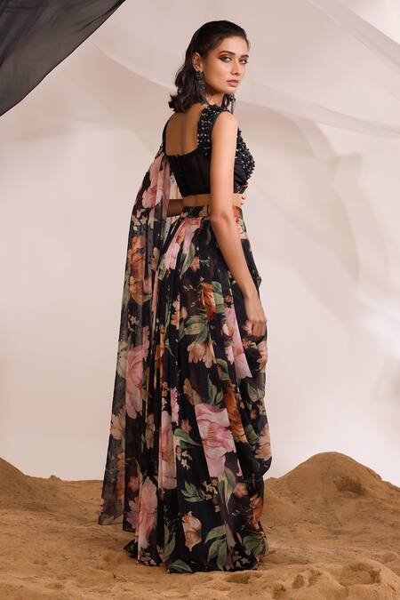 Shop Divya Aggarwal Black Chiffon Printed Floral Notched Skirt With Embellished Draped Blouse at Aza Fashions Shop_Divya Aggarwal_Black Chiffon Printed Floral Notched Skirt With Embellished Draped Blouse _at_Aza_Fashions