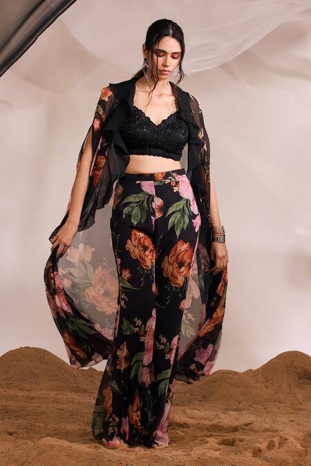 Shop Divya Aggarwal Black Cape And Pant Chiffon Printed Floral V Neck Harlow Ruffle & Set at Aza Fashions Shop_Divya Aggarwal_Black Cape And Pant Chiffon Printed Floral V Neck Harlow Ruffle & Set _at_Aza_Fashions