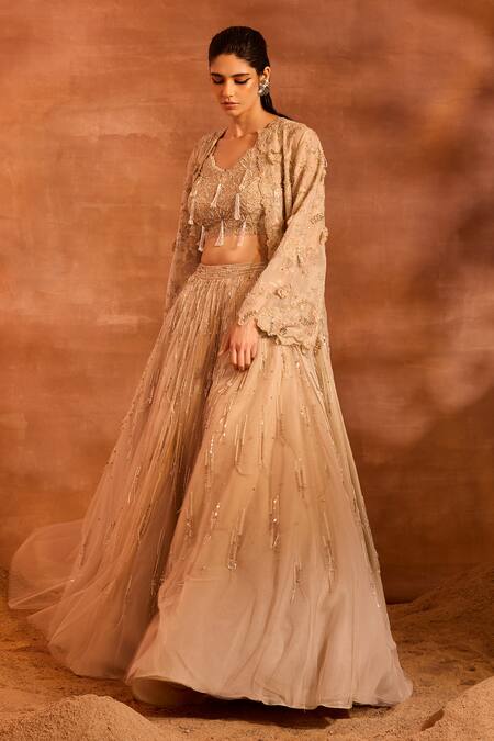 Divya Aggarwal Beige Metallic Chanderi Embellished Tassel Blouse V Idalia Cape And Lehenga Set Online at Aza Fashions Divya Aggarwal_Beige Metallic Chanderi Embellished Tassel Blouse V Idalia Cape And Lehenga Set _Online_at_Aza_Fashions