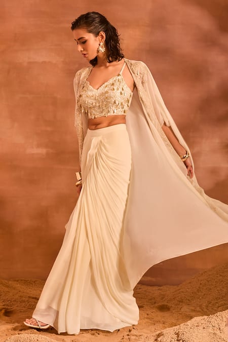 Shop Divya Aggarwal Ivory Chanderi Silk, Georgette Irene Embellished Cape And Draped Skirt Set Online at Aza Fashions Shop_Divya Aggarwal_Ivory Chanderi Silk, Georgette Irene Embellished Cape And Draped Skirt Set _Online_at_Aza_Fashions