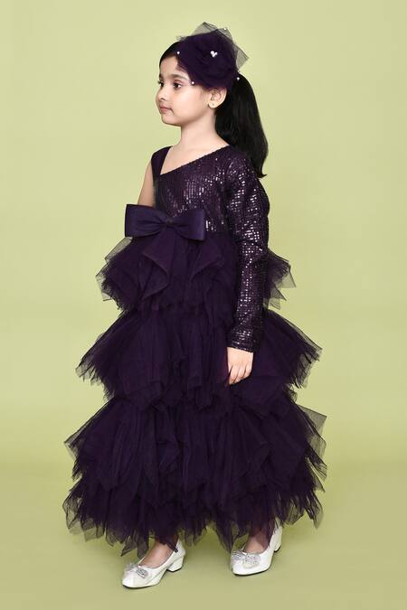 Petite Pomme_Purple Net, Cotton Embellished Ruffle Layered One Shoulder Gown With Hair Pin_at_Aza_Fashions