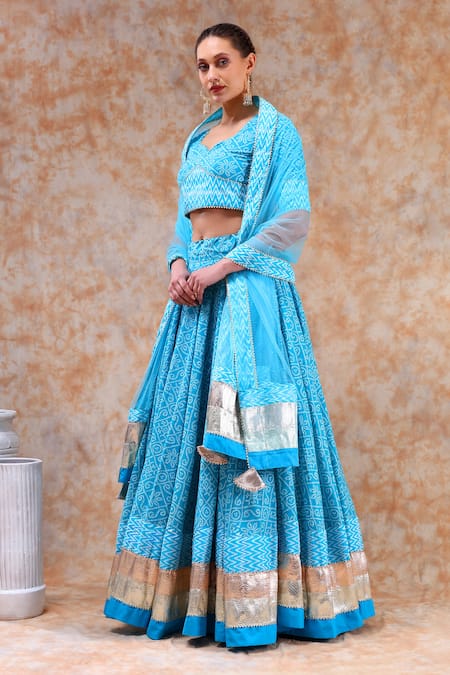 Shop_Pomcha Jaipur_Blue Cotton, Net Gota Patti, Embroidery Asymmetric Bandhani Print Lehenga Set 