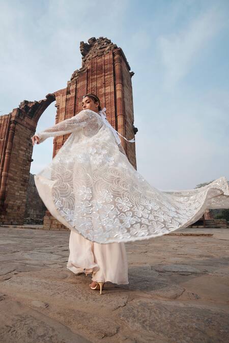 Kashmiraa Ivory Cotton, Georgette Beads, Sequins Floral Embroidered Cape Sharara Set Online at Aza Fashions Kashmiraa_Ivory Cotton, Georgette Beads, Sequins Floral Embroidered Cape Sharara Set _Online_at_Aza_Fashions