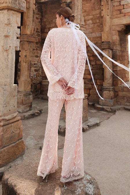 Shop Kashmiraa Peach Net, Cotton Sequins, Beads V-neck Embroidered Scallop Kurta With Pant at Aza Fashions Shop_Kashmiraa_Peach Net, Cotton Sequins, Beads V-neck Embroidered Scallop Kurta With Pant _at_Aza_Fashions