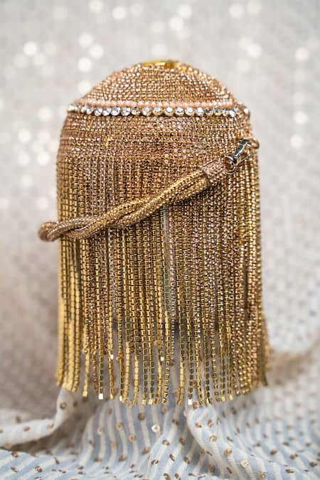 Shop Nayaab By Sonia Gold Diamonds Celestial Radiant Sunburst Embellished Potli at Aza Fashions Shop_Nayaab By Sonia_Gold Diamonds Celestial Radiant Sunburst Embellished Potli _at_Aza_Fashions