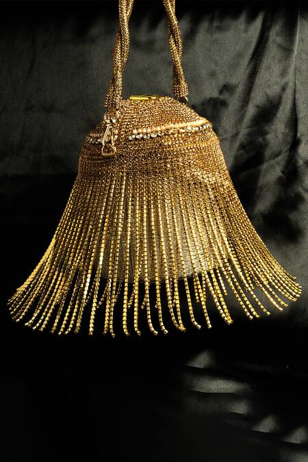 Shop Nayaab By Sonia Gold Diamonds Celestial Radiant Sunburst Embellished Potli Online at Aza Fashions Shop_Nayaab By Sonia_Gold Diamonds Celestial Radiant Sunburst Embellished Potli _Online_at_Aza_Fashions