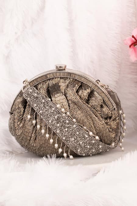 Shop Nayaab By Sonia Grey Cut Work, Pearls Chique Stripe Pattern Potli at Aza Fashions Shop_Nayaab By Sonia_Grey Cut Work, Pearls Chique Stripe Pattern Potli _at_Aza_Fashions