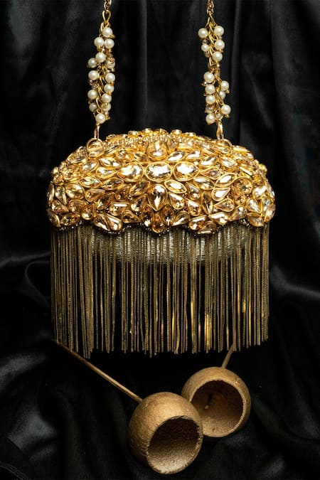 Shop Nayaab By Sonia Gold Stones Diamond Hinted Radiance Embellished Potli at Aza Fashions Shop_Nayaab By Sonia_Gold Stones Diamond Hinted Radiance Embellished Potli _at_Aza_Fashions