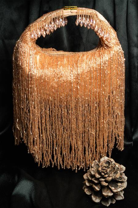 Shop Nayaab By Sonia Peach Beads, Tassels Sailor Embellished Potli at Aza Fashions Shop_Nayaab By Sonia_Peach Beads, Tassels Sailor Embellished Potli_at_Aza_Fashions