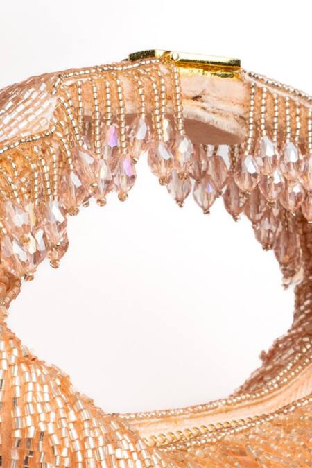 Shop Nayaab By Sonia Peach Beads, Tassels Sailor Embellished Potli Online at Aza Fashions Shop_Nayaab By Sonia_Peach Beads, Tassels Sailor Embellished Potli_Online_at_Aza_Fashions