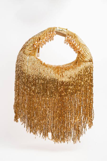 Nayaab By Sonia Gold Beads, Tassels Embellished Sailor Potli at Aza Fashions Nayaab By Sonia_Gold Beads, Tassels Embellished Sailor Potli_at_Aza_Fashions