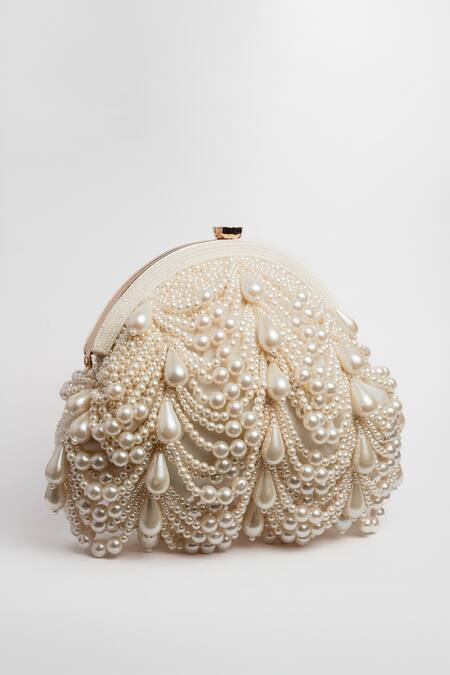 Buy Nayaab By Sonia Off White Pearls Oyster Frame Snowflake Embellished Potli Clutch Online at Aza Fashions Buy_Nayaab By Sonia_Off White Pearls Oyster Frame Snowflake Embellished Potli Clutch _Online_at_Aza_Fashions