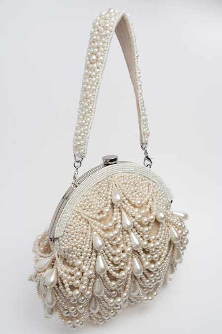 Shop Nayaab By Sonia Off White Pearls Oyster Frame Snowflake Embellished Potli Clutch Shop_Nayaab By Sonia_Off White Pearls Oyster Frame Snowflake Embellished Potli Clutch