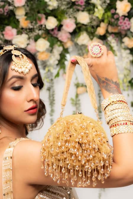 Nayaab By Sonia Gold Cut Work, Beads Lattice Frame Aurum Embellished Clutch Online at Aza Fashions Nayaab By Sonia_Gold Cut Work, Beads Lattice Frame Aurum Embellished Clutch _Online_at_Aza_Fashions