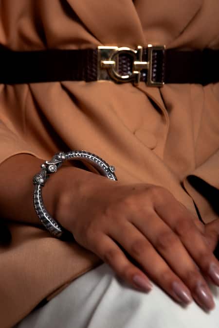 Neeta Boochra Silver Plated Serpentine Charm Engraved Tribal Bangle Online at Aza Fashions Neeta Boochra_Silver Plated Serpentine Charm Engraved Tribal Bangle _Online_at_Aza_Fashions